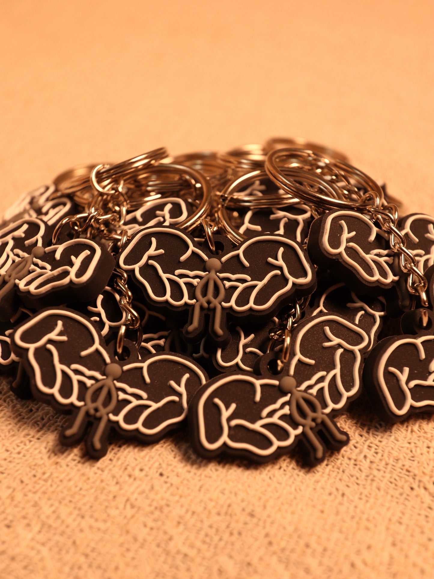 HANDLE WITH CARE KEYRINGS.